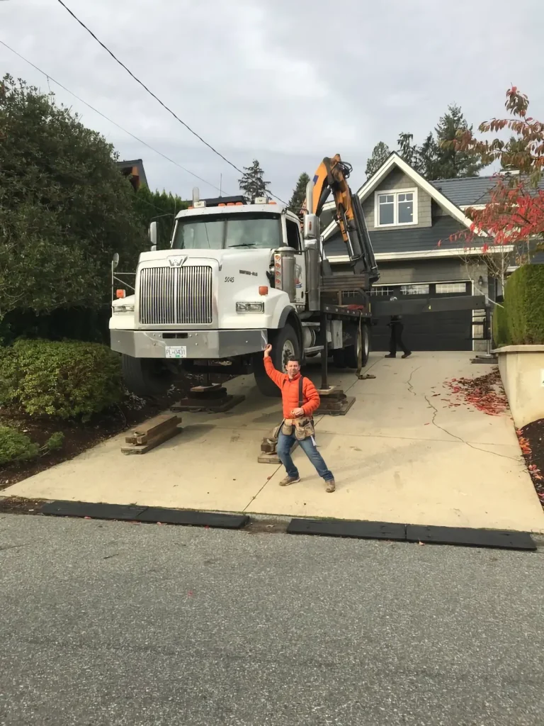 Steve standing in front of a big truck